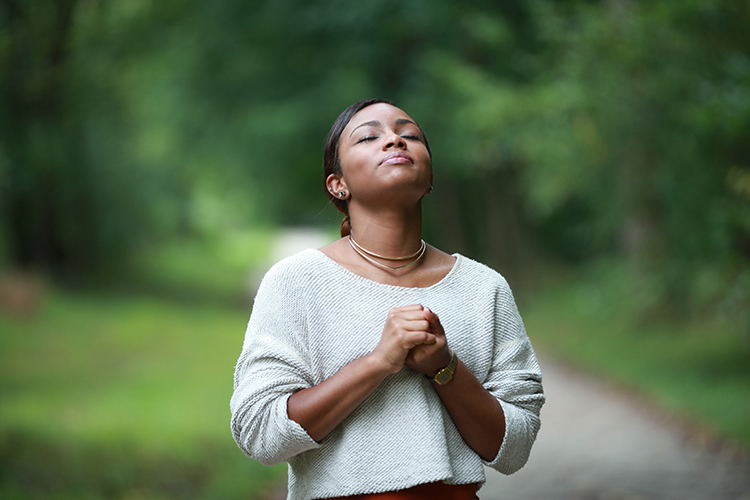Person engaged in prayer and meditation